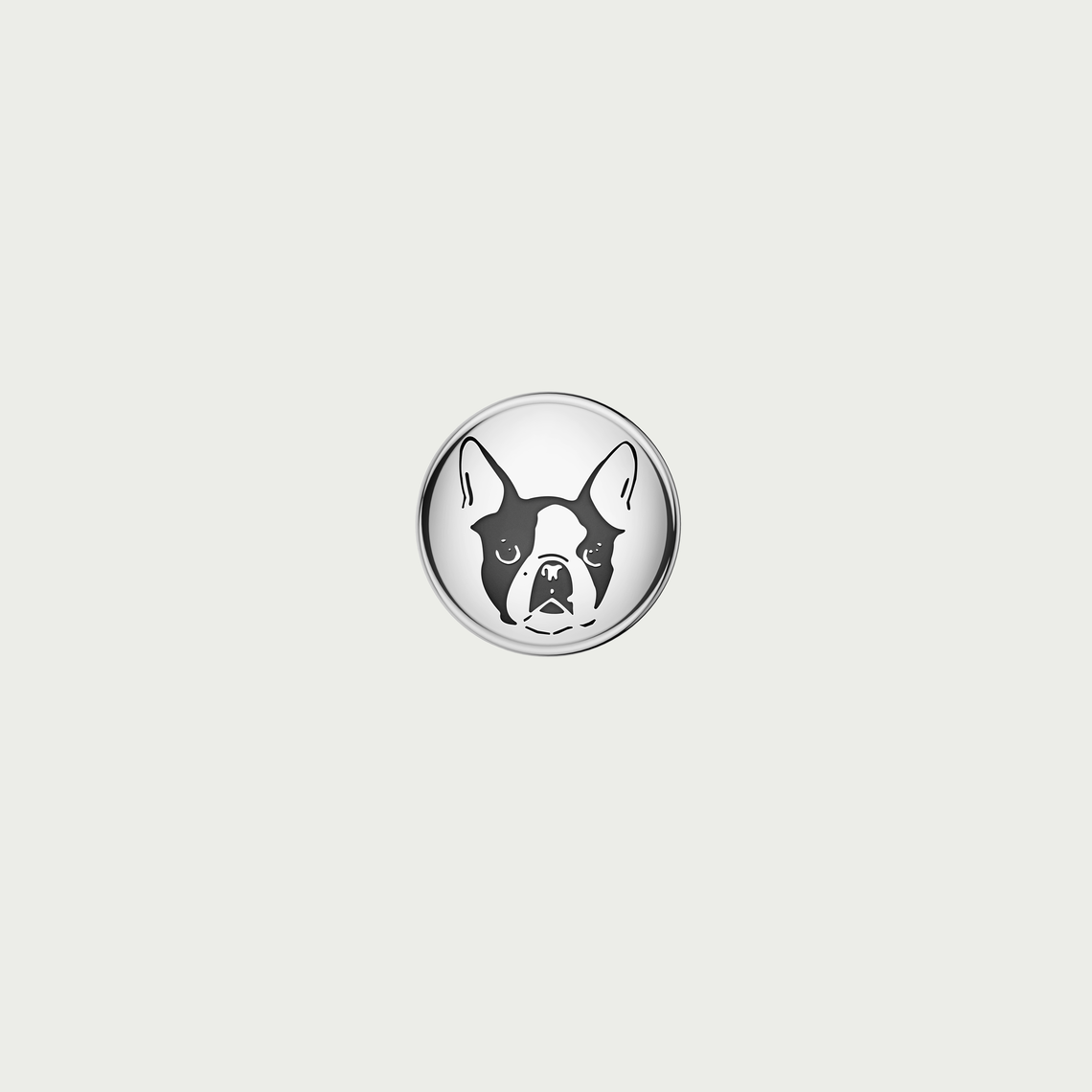 Charm Tweed Co. en acier représentant un chien type bouledogue, symbole de caractère et d'attachement.